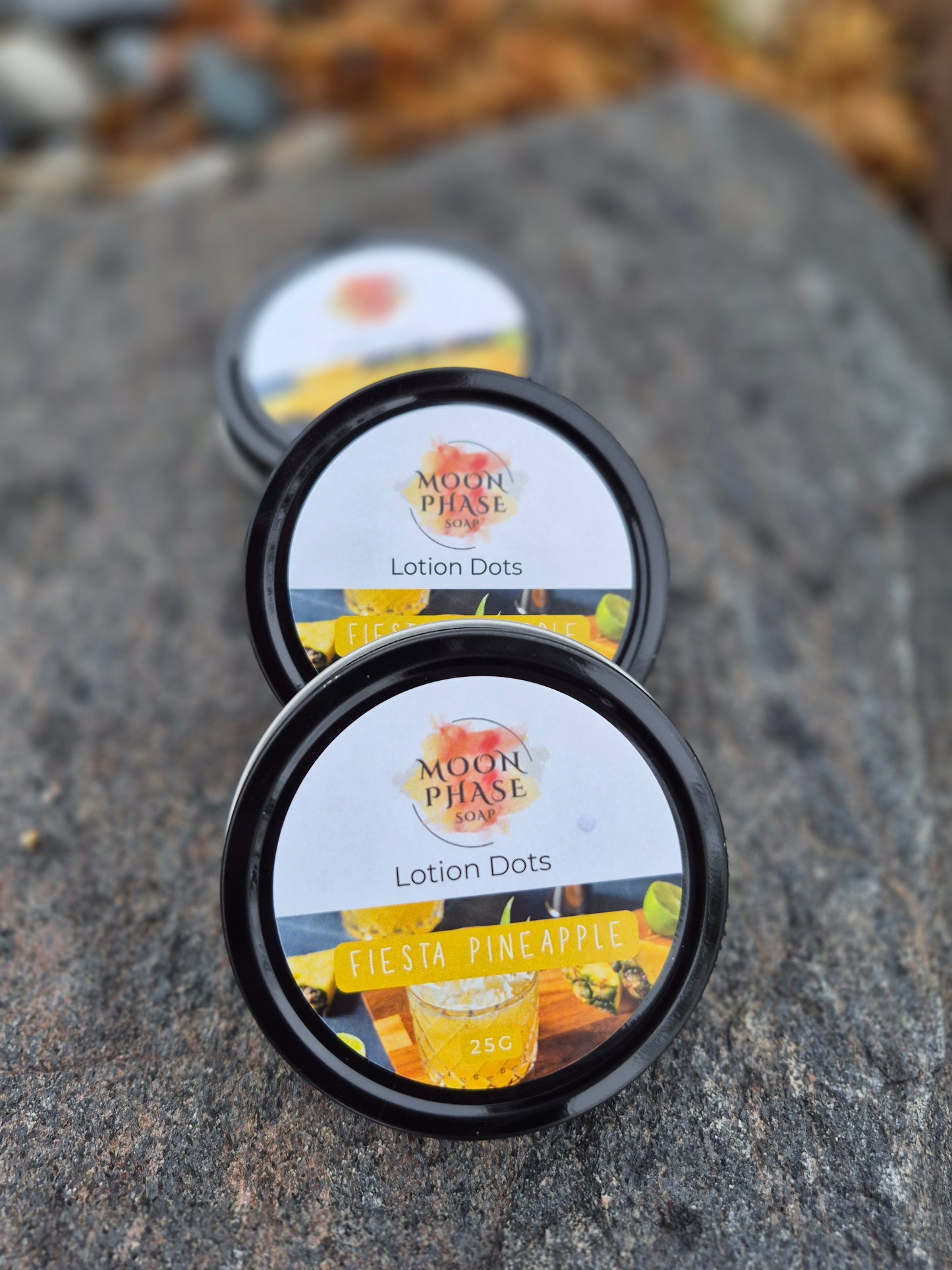 Open tin of Moon Phase Soap Fiesta Pineapple Lotion Dots